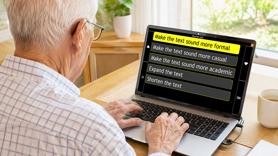 GuideConnect shown on a laptop. The screen displays the 'Rewrite Text' menu and he has selected 'Make the text sound more formal'